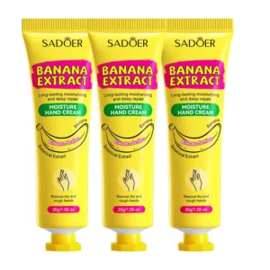 Three tubes of SADOER Banana Extract Hand Cream for moisturizing dry and rough hands.