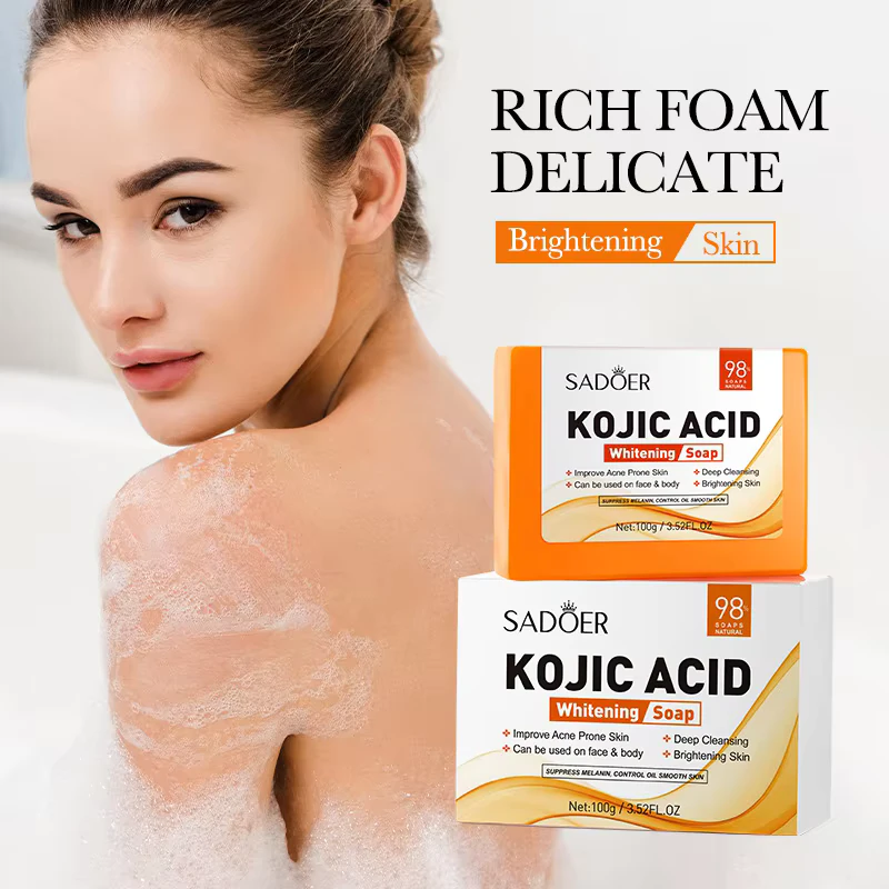 SADOER Kojic Acid Soap Bar packaging alongside a woman with rich, skin-brightening foam lather.