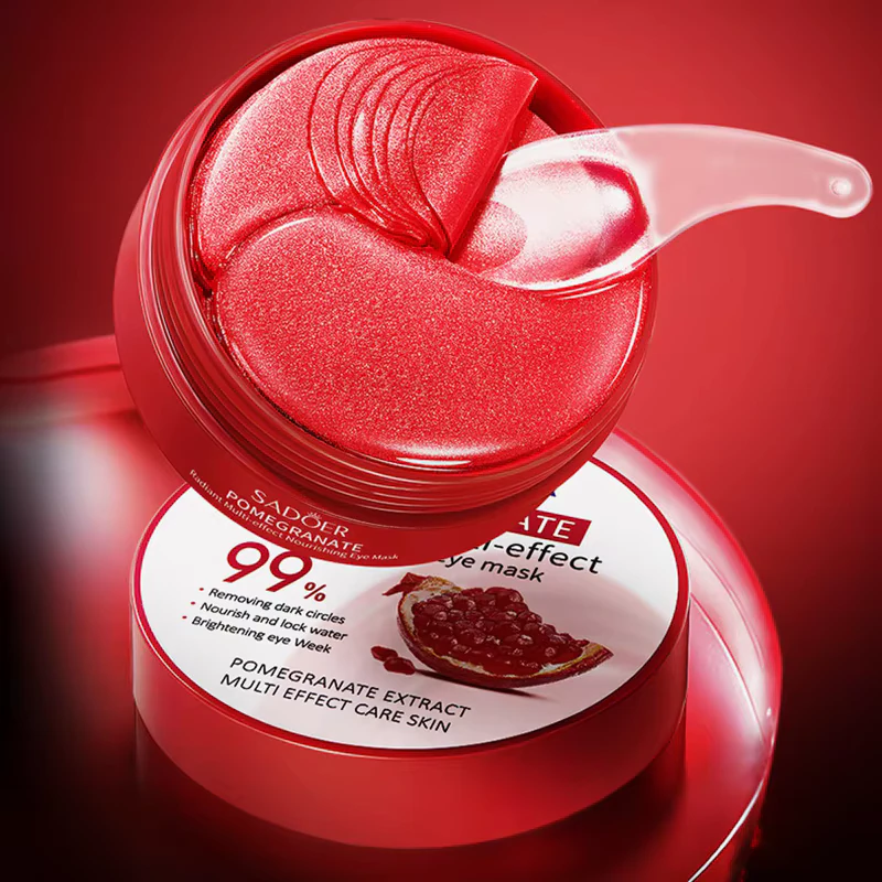 SADOER Pomegranate Eye Mask Patches being lifted from the jar with a clear spatula.