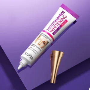 SADOER Nicotinamide Freckle Face Cream white tube and gold cap on purple background.