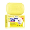SADOER Sulfur Soap Bar resting on its yellow packaging for acne-prone skin deep cleansing.
