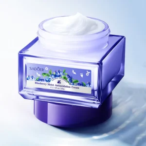 Open jar of SADOER Blueberry Antioxidant Face Cream displaying its smooth, hydrating white texture.