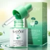 SADOER Centella Asiatica B5 Serum bottle and matching packaging box over green water ripples.