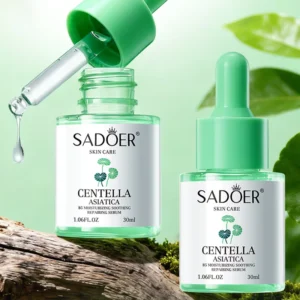 SADOER Centella Asiatica B5 Serum bottles on natural wood with a dripping serum dropper.