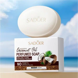 SADOER Coconut Oil Soap Bar and packaging displayed against a bright tropical beach background.