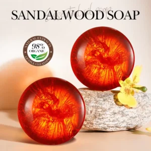 Two translucent amber SADOER Sandalwood Essential Oil Soap Bars with 98% organic natural extracts.
