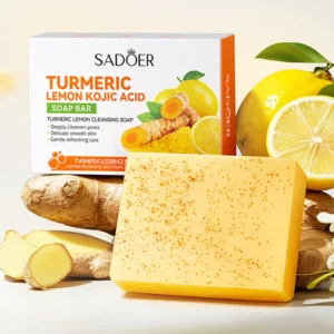SADOER Turmeric Soap Bar and box displayed with fresh lemon and turmeric root ingredients.
