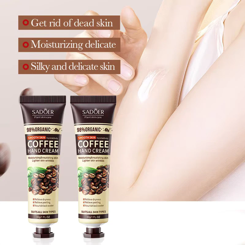 SADOER Coffee Hand Cream moisturizing skin next to two standing tubes.