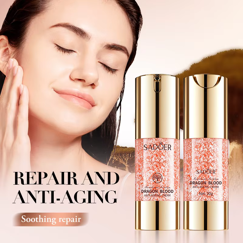 SADOER Dragon Blood Anti-Ageing Face Cream bottles beside a woman with a smooth, radiant complexion.